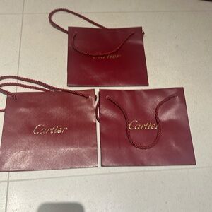 Cartier 3 small to medium bags.